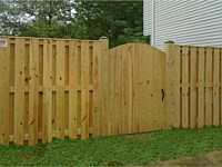 <b>Pressure Treated Board on Board Privacy Fence with single arched gate</b>